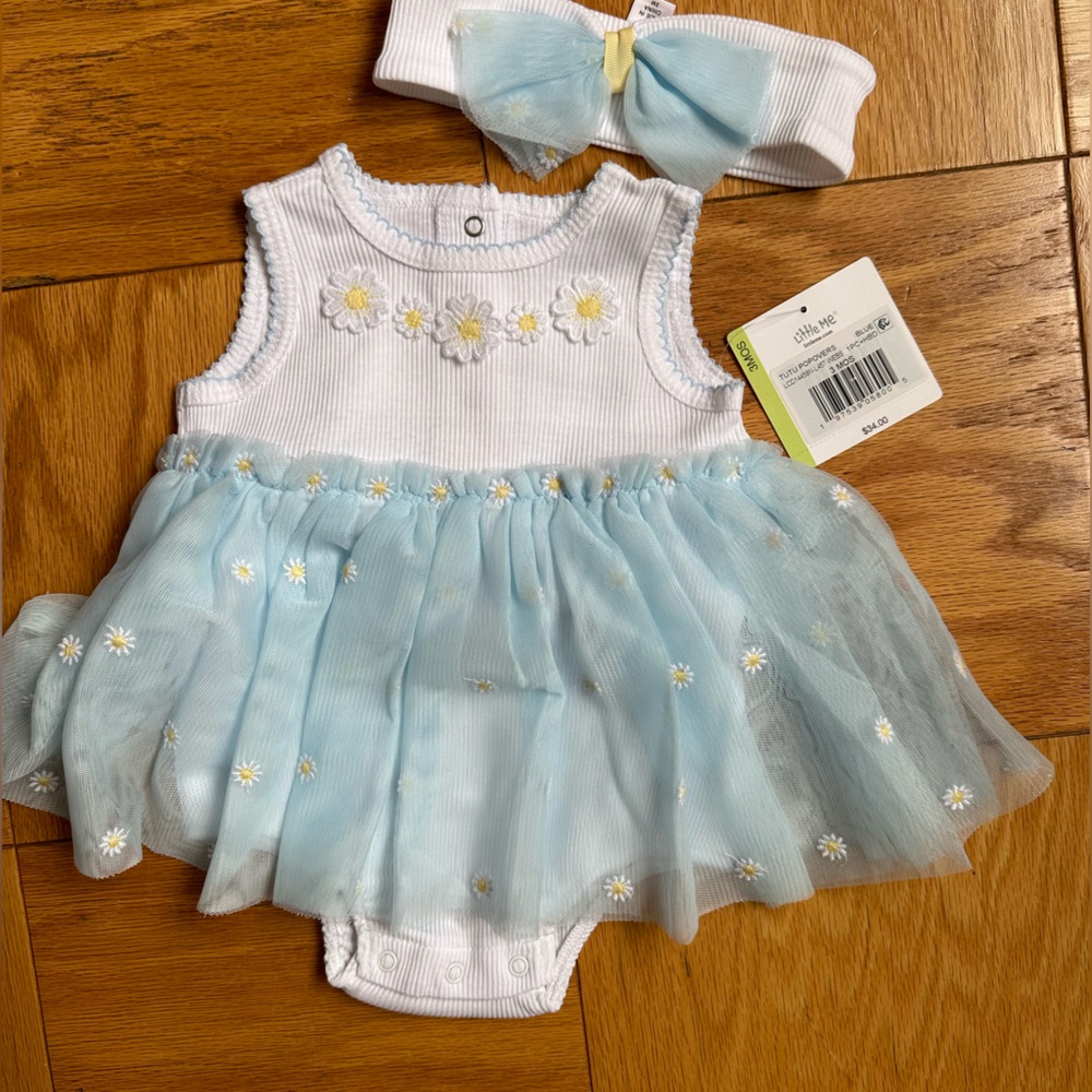 New with tags! Daisy onesie with matching headband